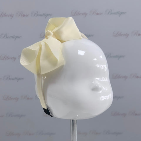 Bowtique London Bow HeadBand Cream