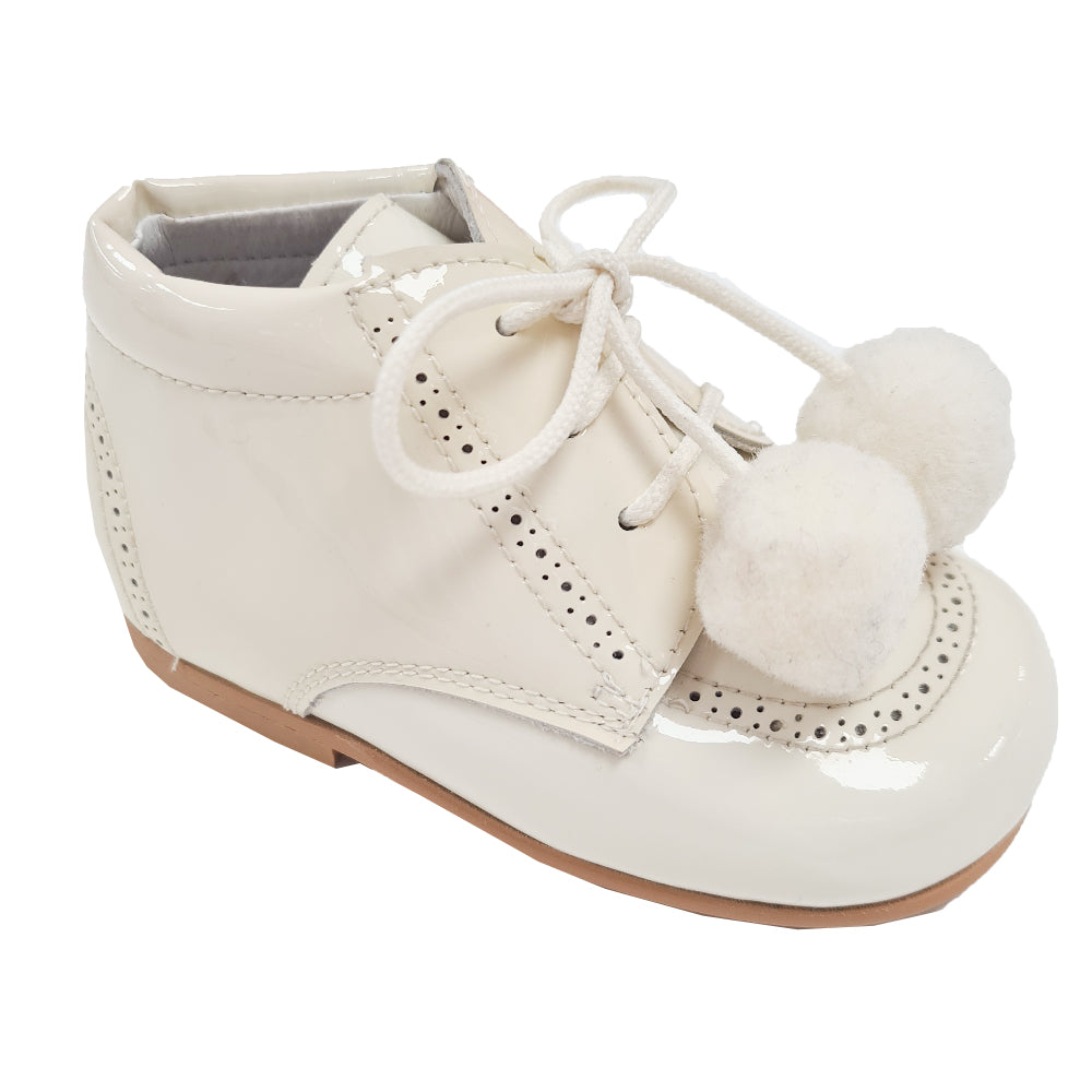 TNY Patent Leather Pom Pom Boots Cream